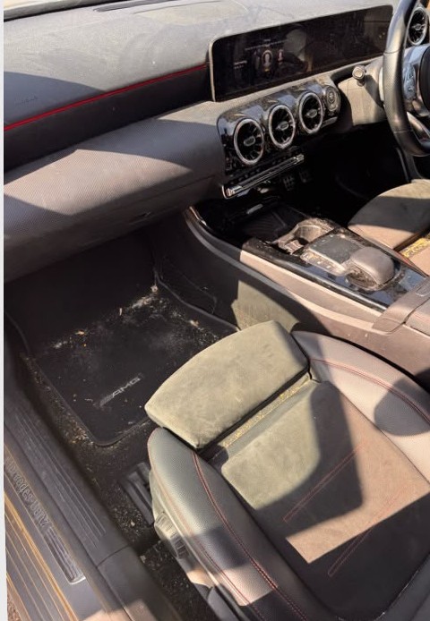 Mercedes-Benz A-Class AMG interior before a deep clean, dirty footwell and seats